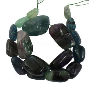 Edelsteine am Strang Fluorit große Nuggets gebohrt 10-26x16-38mm