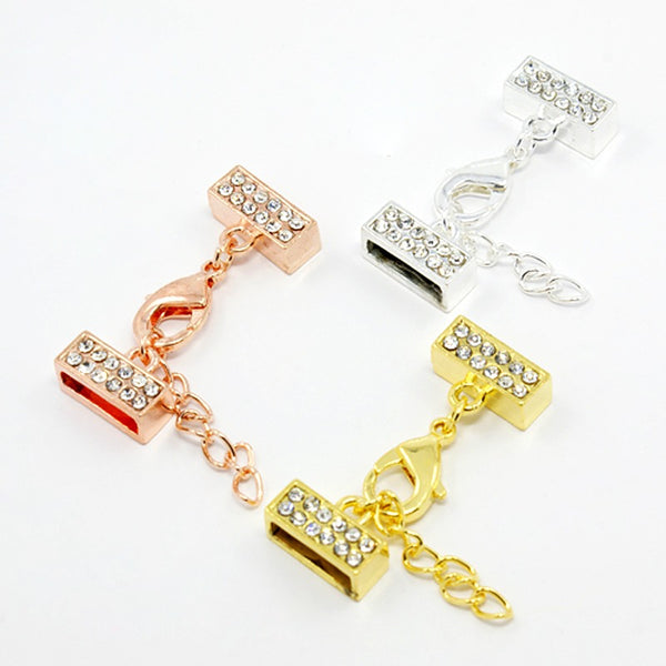 Kappelverschluss rechteckig / Strass 32x13mm innen 11x2mm per Set