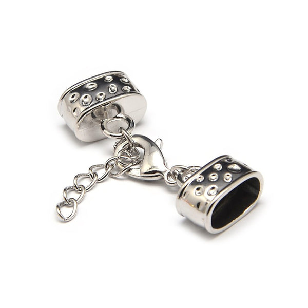 Kappelverschluss oval gepunktet 43x15mm innen: 7x12mm per Set