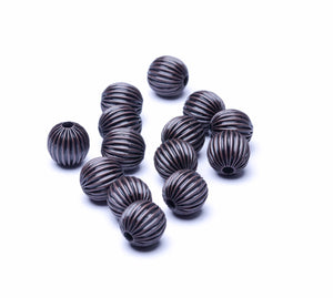 Metallperlen braun gerillt 10mm 27 Stk.