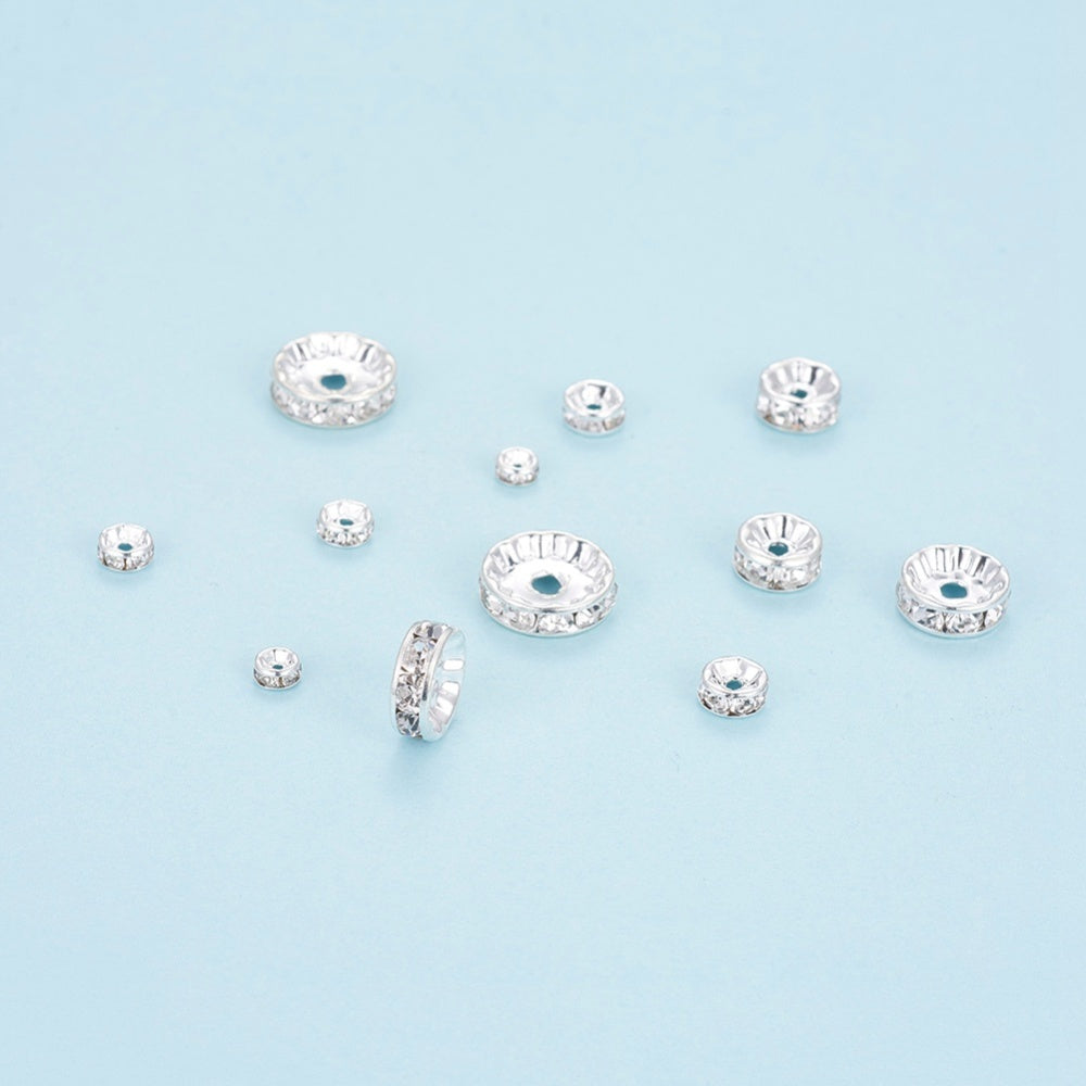 Rondell-Set Messing Strass-Abstandshalter silber 8x2cm 120 Stück.