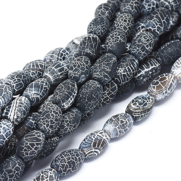 Weathered Agate Perle oval schwarz/weiße Crackles 12x8mm per Stück