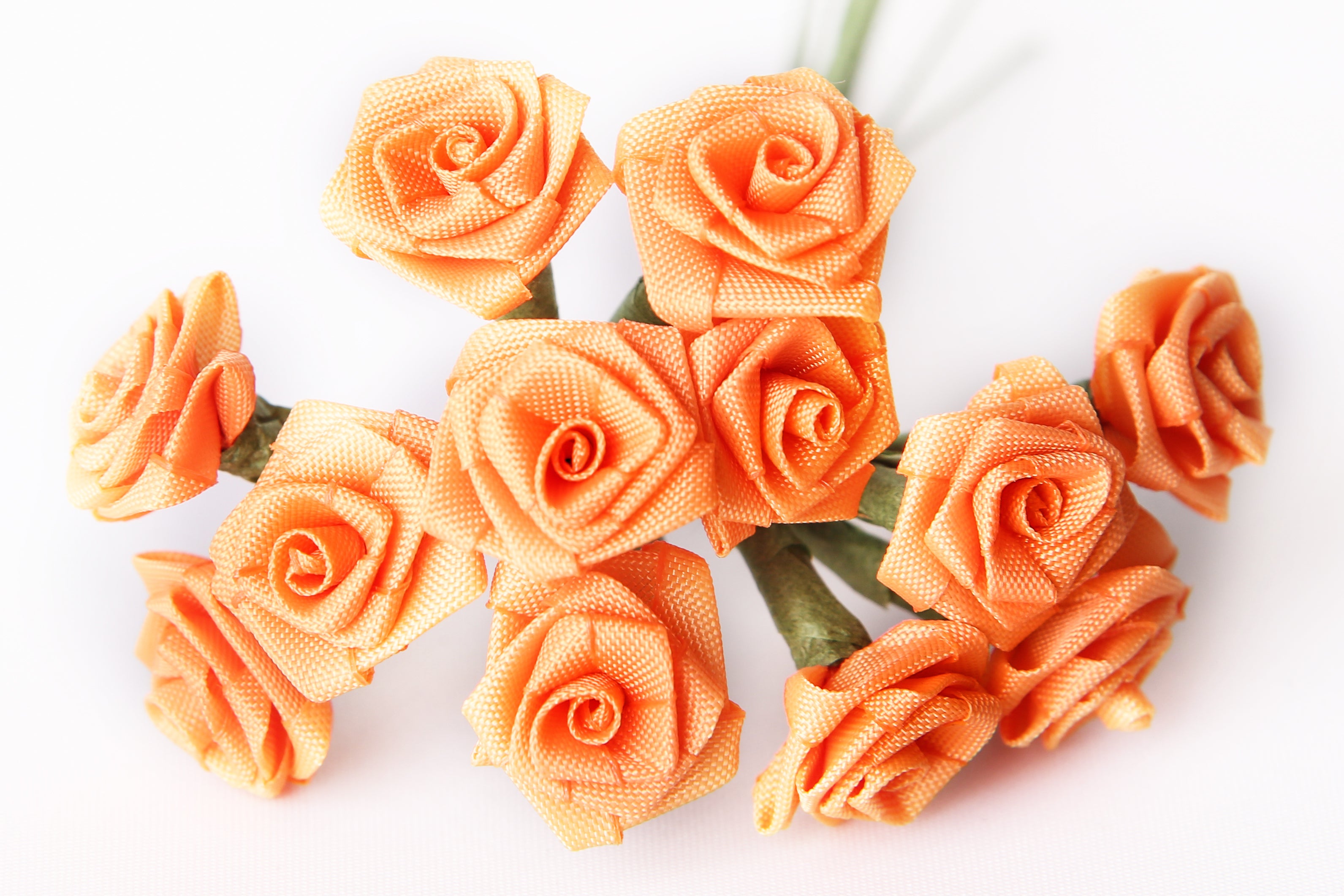 Diorröschen orange 14mm 12 Stück/Bund