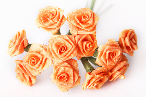 Diorröschen orange 14mm 12 Stück/Bund