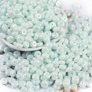 Glasperlen Donut Rondell opak Pastell 6,5x3mm 100 Stück