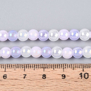 Glasperlen AB Meerjungfrau-Mix lilac rund 6mm 60 Stück / Dose