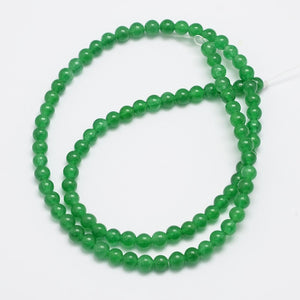 Jadeperlen rund grün gefärbt 4mm 92 Perlen / Strang 38cm