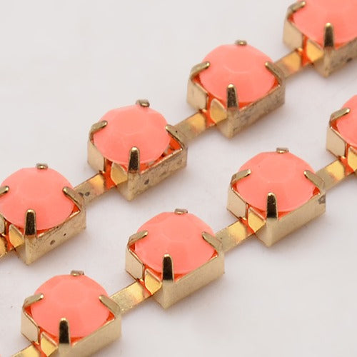 Strass-Kette Korallenopal, goldfärbig 6x5mm, pro Laufmeter