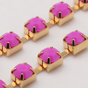 Strass-Kette fuchsia opal goldfärbig 6x5mm per Laufmeter