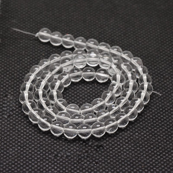 Kristallglasperlen rund Grade AA klar transparent 6mm 68 Stück / Strang