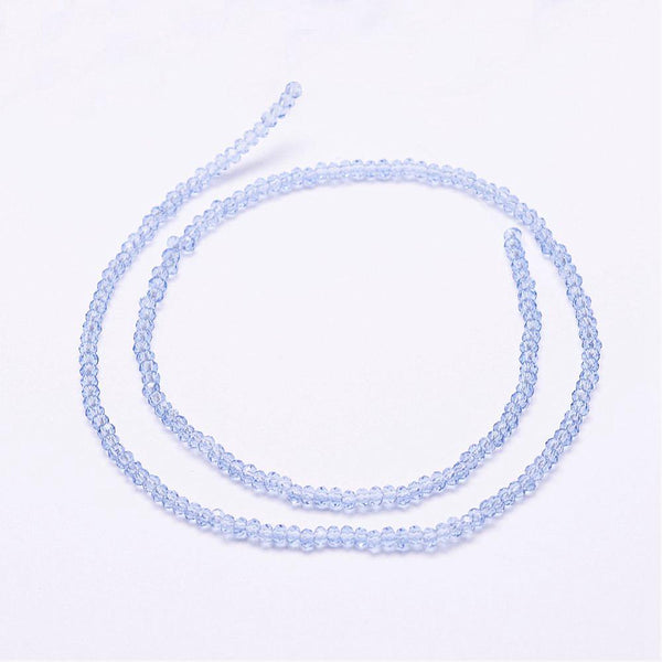 Glasschliffperlen Rondelle facettiert Cornflower Blue transparent 2,5x1,5mm 152 Stück / Strang