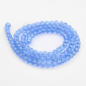 Glasschliffperlen Rondell facettiert kornblumenblau transparent 10mm 72 Stück / Strang