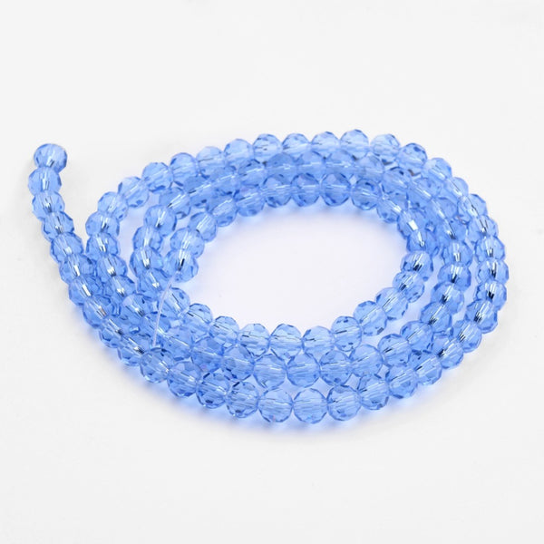Glasschliffperlen Rondell facettiert kornblumenblau transparent 10mm 72 Stück / Strang