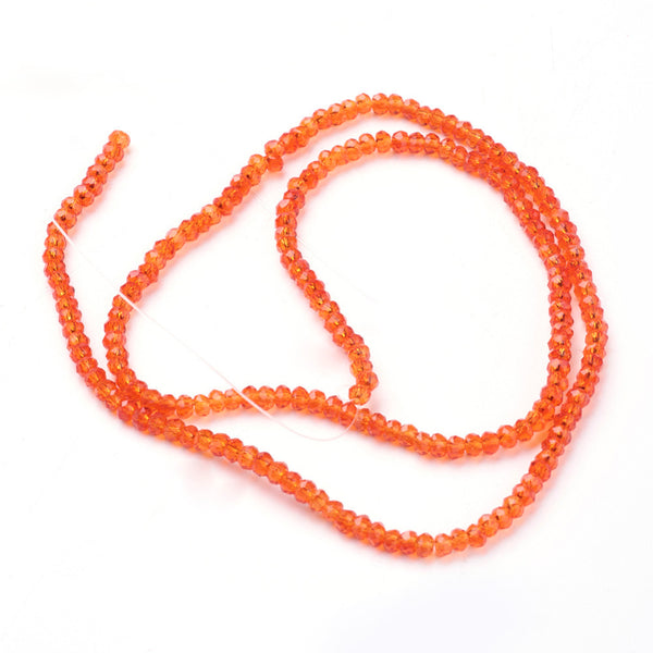 Glasschliffperlen Rondelle facettiert orangerot 3x2mm 135 Stück / Strang