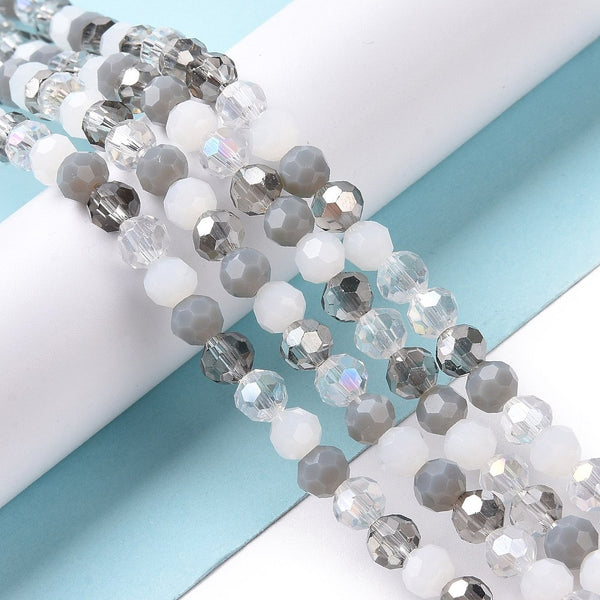 Glasschliffperlen rund facettiert grau 5,5mm 95 Stück / Strang