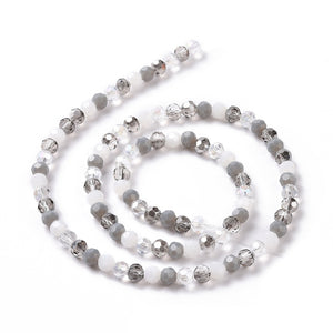 Glasschliffperlen rund facettiert grau 5,5mm 95 Stück / Strang