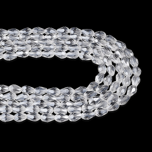 Glasschliffperlen Tropfen facettiert klar transparent 6x4mm 65 Stück / Strang