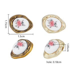 Blumenknöpfe mit Rosenmotiv gold weiß oval 15x11,5mm 1 Stück