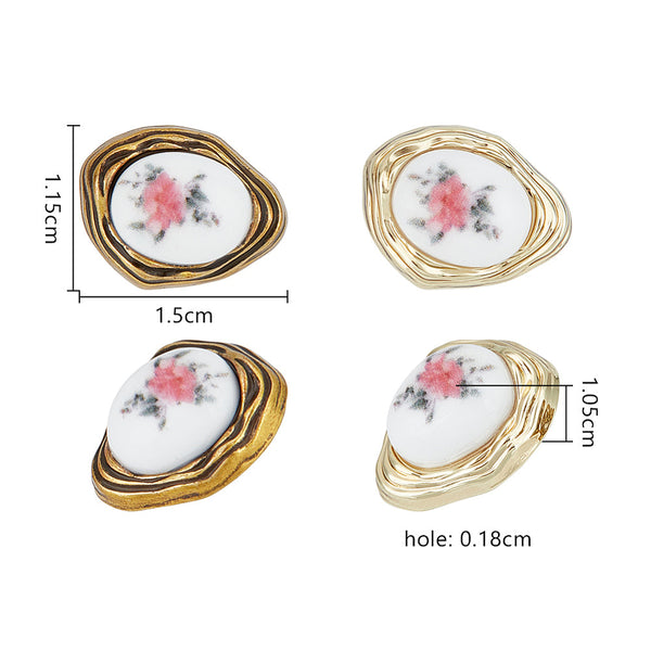 Blumenknöpfe mit Rosenmotiv gold weiß oval 15x11,5mm 1 Stück