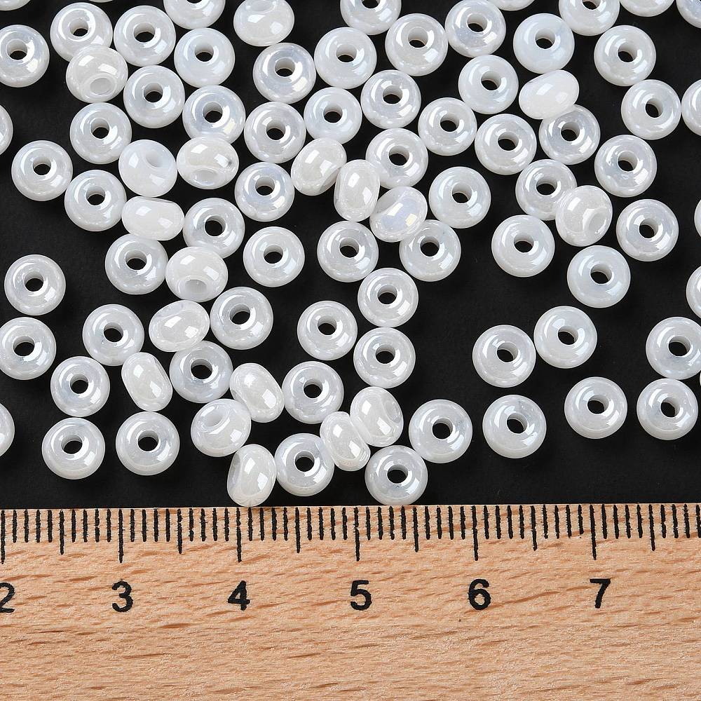 Rocailles Donut pearl white luster 5x3mm 140 Stück 